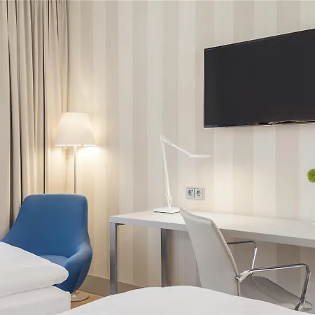 إن إتش سيتي فندق 4*